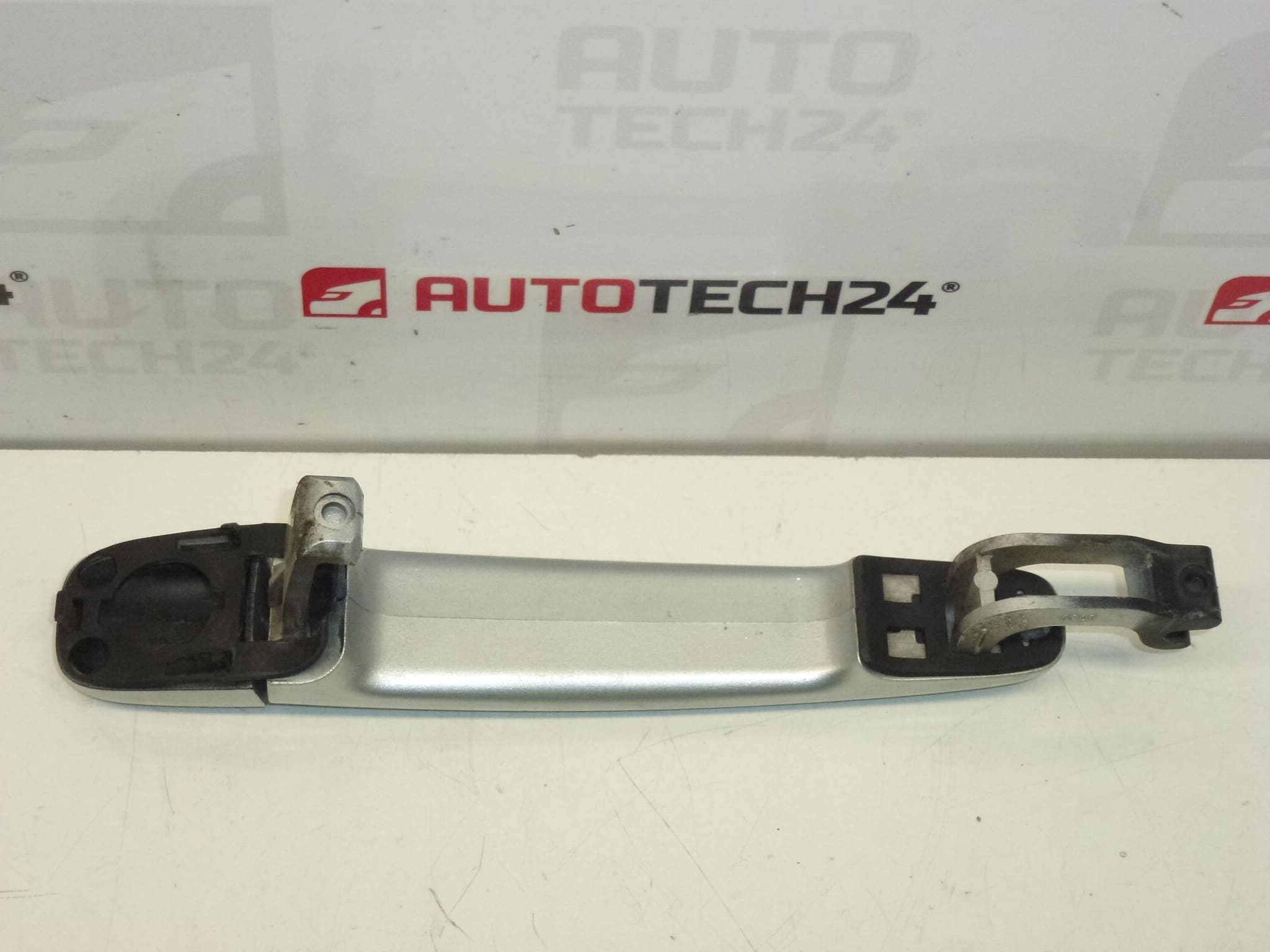 Kľučka dverí Citroën Peugeot strieborná EZRC 9101W4